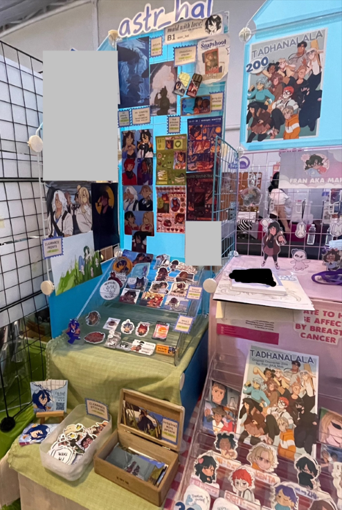 Hal's booth setup for the con, a 1 grid wide section. Some parts are censored for privacy.