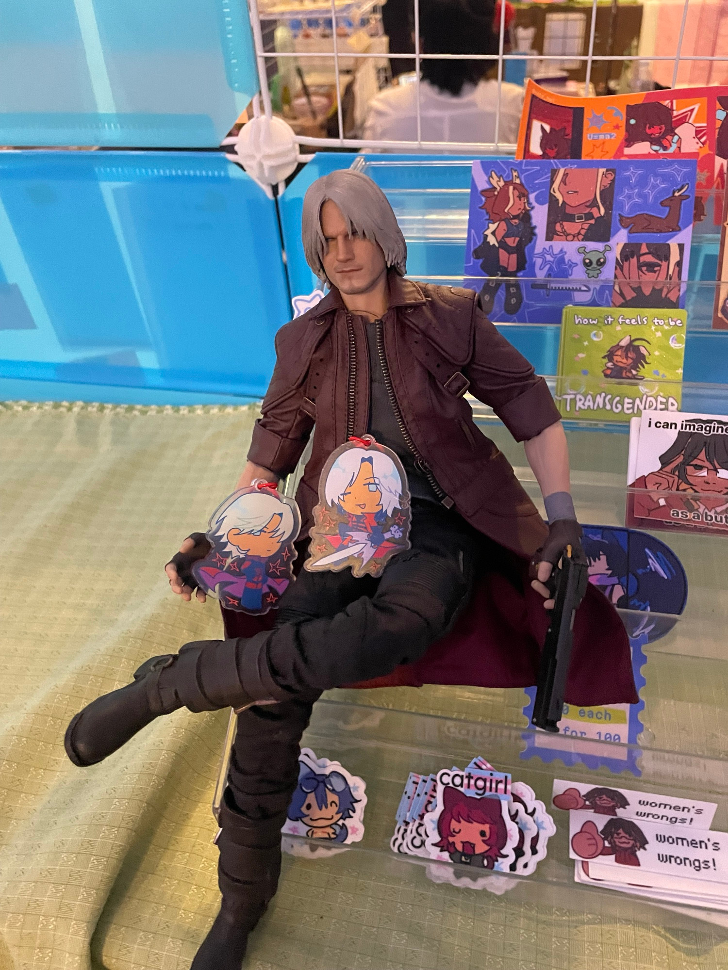 Dante DMC5 figure holding my Dante charms.