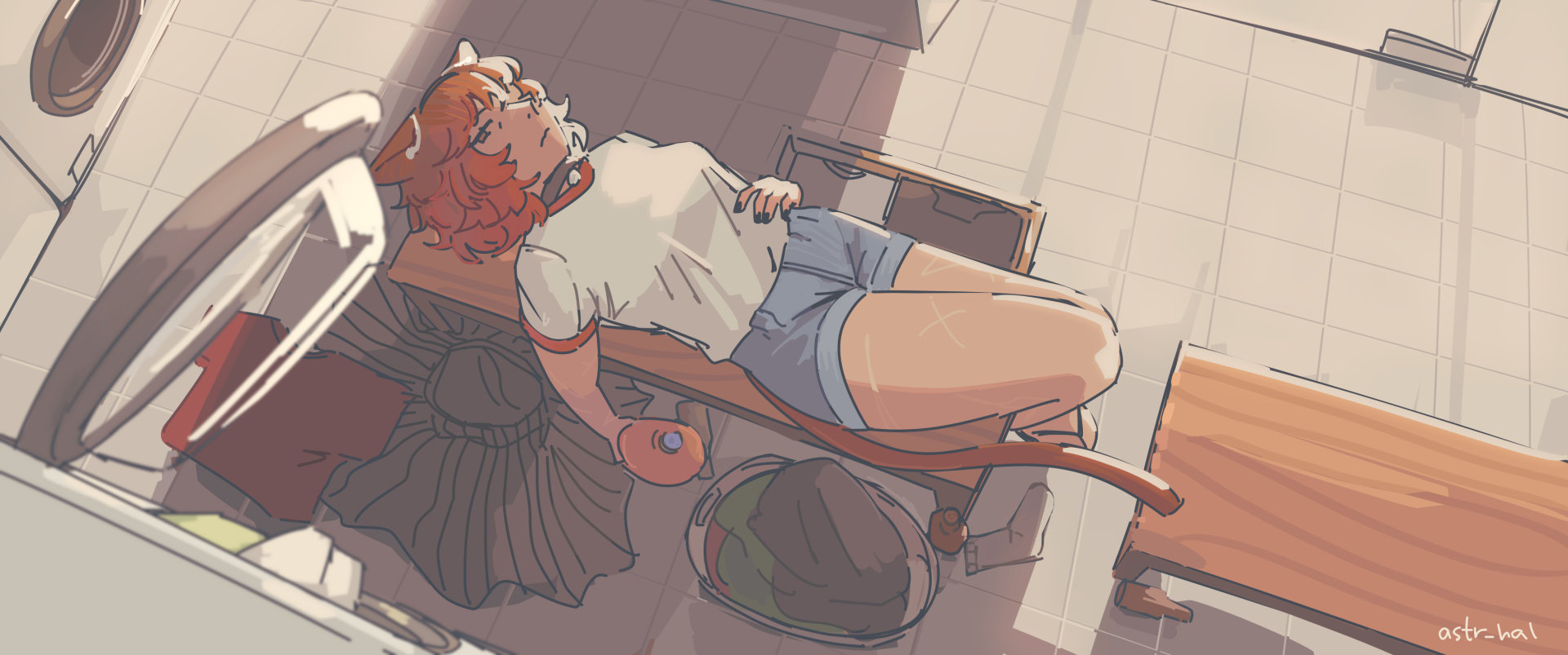 Fiore hungover in a laundromat, lying on a bench and staring at an open dryer.