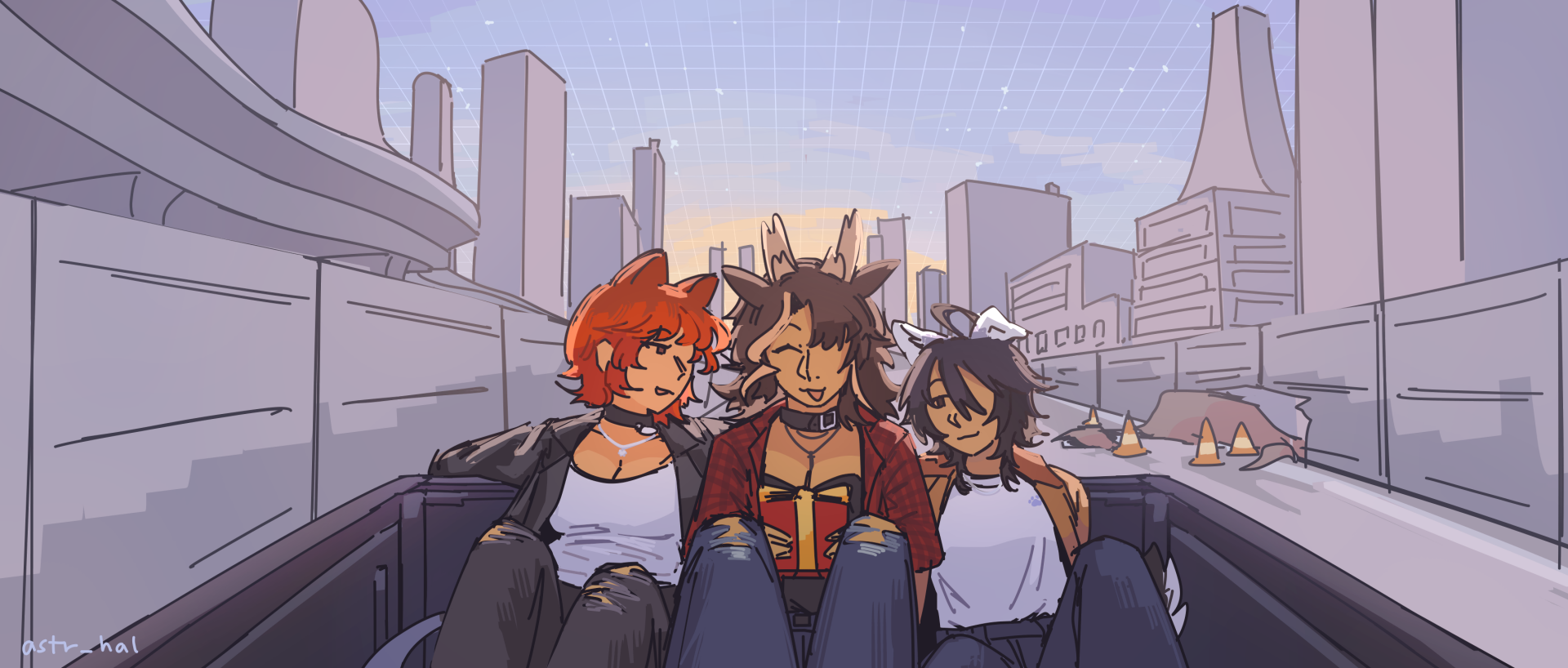 Fiore, Camille, and Ethan sitting in the back of a pickup truck, Camille holding a gift box.